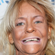 Illustration for article titled Oh, Good: Tan Mom is Back With a New Music Video and Very White Teeth
